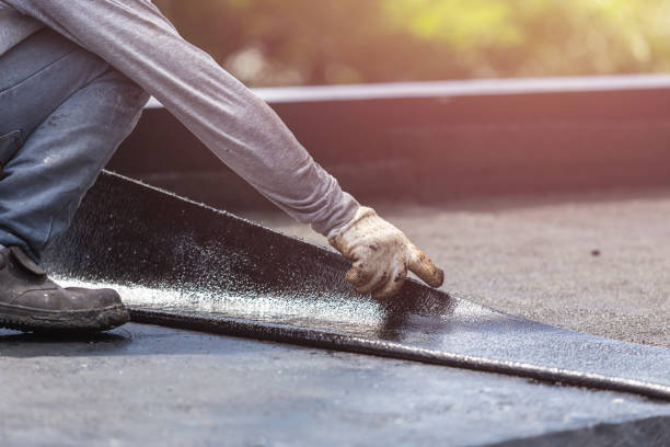 Professional Wet Basement Repair technician working in Toughkenamon, PA